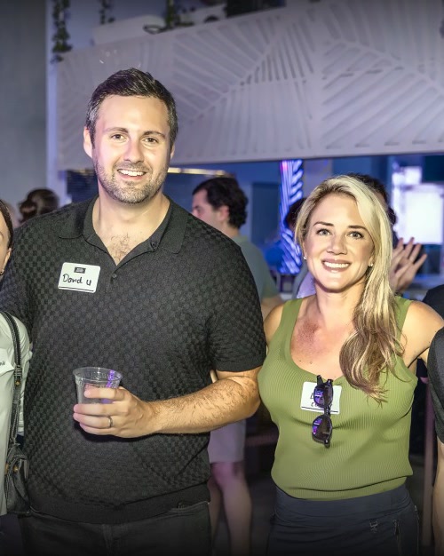 Two guests smiling at the September 2026 season launch
