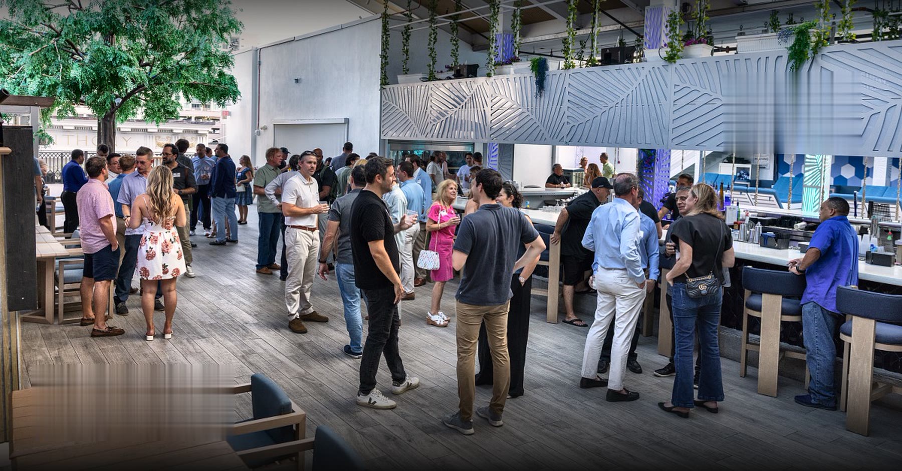 The rooftop at Top of the Rox filling up for the September 2026 season launch