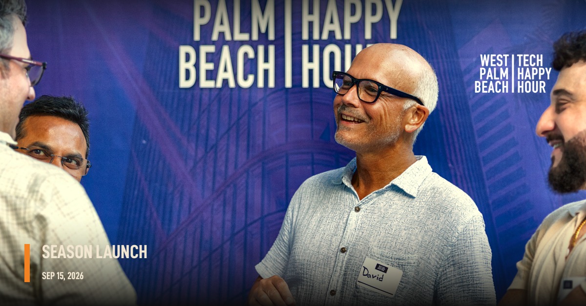 Attendees in front of the WPB Tech Happy Hour backdrop