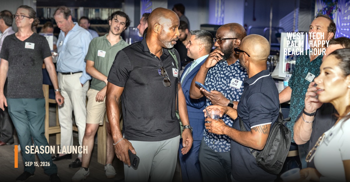 A crowd of attendees networking